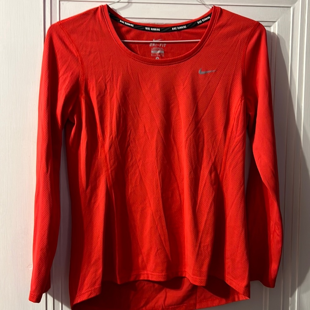 Women’s red Nike Running/Workout Shirt